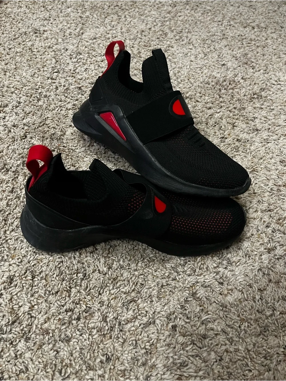 Champion Men's Black Athletic Slip-On Sneakers with Red Accents